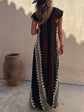 Vestido Boho Chic con Escote en V Profundo – Elegancia que Fluye con Cada Paso