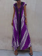 Vestido Boho Chic con Escote en V Profundo – Elegancia que Fluye con Cada Paso