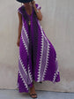 Vestido Boho Chic con Escote en V Profundo – Elegancia que Fluye con Cada Paso