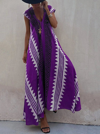 Vestido Boho Chic con Escote en V Profundo – Elegancia que Fluye con Cada Paso