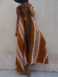 Vestido Boho Chic con Escote en V Profundo – Elegancia que Fluye con Cada Paso